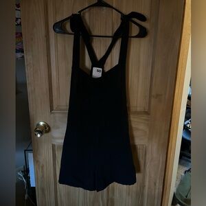 black fabric overalls